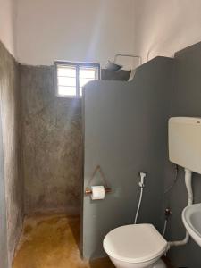 Koupelna v ubytování Karanga Bungalows + 49 fotografií
