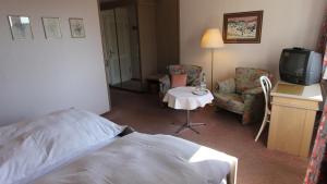 Voodi või voodid majutusasutuse Hotel Gasthaus Tröster toas