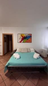 En eller flere senge i et værelse på Alida + 15 billeder