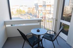 En balkon eller terrasse på Appartement proche des bords de Marne
