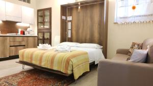 Postel nebo postele na pokoji v ubytování La Suite di San Rufino, 75mq, 2 letti matrimoniali - MyAssisiSuite - Mówimy po polsku