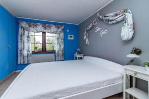 En eller flere senge i et værelse på JON872-Hjaeltevad-Hasselvaegen-2