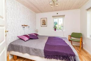 Postel nebo postele na pokoji v ubytování BLE835-Sturkoe-Sturkoevaegen-44