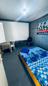 Giường trong phòng chung tại El Gringo Banheiro privativo