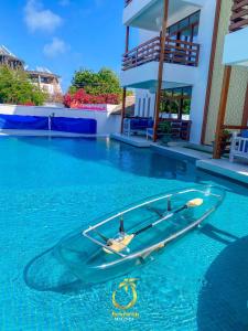 a boat in the water in a swimming pool at Jumeirah Malindi Hotel in Malindi
