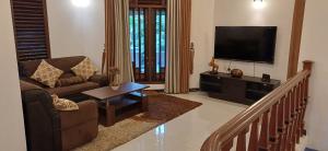 Et tv og/eller underholdning på Villa Meghana