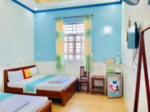 Postel nebo postele na pokoji v ubytování Trúc Nguyên - Vĩnh Hy Homestay + 59 fotografií