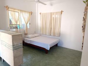 Postel nebo postele na pokoji v ubytování Zicatelas Depa