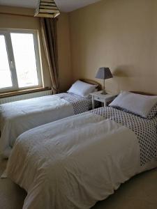 A bed or beds in a room at St. Catherines