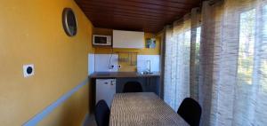 Kuchyň nebo kuchyňský kout v ubytování Plumeria 2