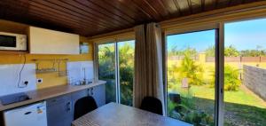 Kuchyň nebo kuchyňský kout v ubytování Plumeria 2