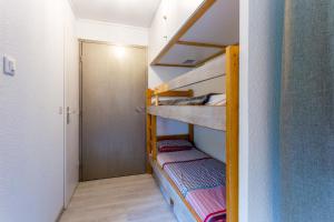 Giường trong phòng chung tại L'Eclose - Alpe d'Huez
