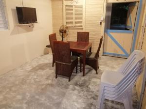 a dining room with a table and chairs covered in snow at El Conde del Macao in Salado