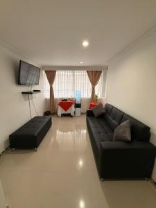 Et opholdsområde på Hotel Sangil Tuluá