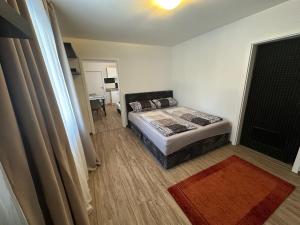 En eller flere senge i et værelse på Wohnung in Sankt Englmar Nr 415 + 14 billeder