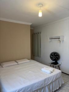 En eller flere senge i et værelse på Suites Premium Jacarey, Fortaleza + 16 billeder