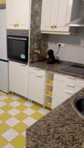 Køkken eller tekøkken på Apartalux Isla Cristina