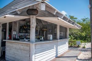 a building with a bar in the middle at Grand Sunset Princess - All Inclusive in Playa del Carmen