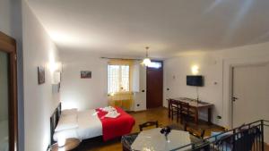 En eller flere senge i et værelse på All'Ombra di Santa Chiara, 140mq, 3 camere, Idromassaggio - Novità da MyAssisiSuite - Mówimy po polsku