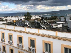 a view of a city from a building at Pension Gibraltar in Tangier