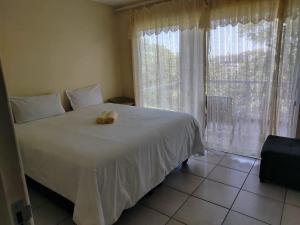 Giường trong phòng chung tại Shelly Beach Guest House +29 ảnh