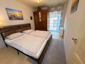 Postel nebo postele na pokoji v ubytování Großzügiges Haus in Moselnähe