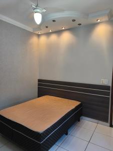 En eller flere senge i et værelse på Casa Com Piscina Temporada + 15 billeder