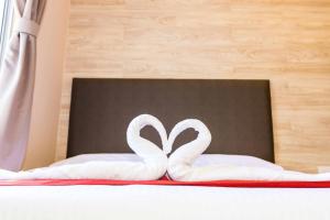 Postel nebo postele na pokoji v ubytování Icon Hotel Segamat