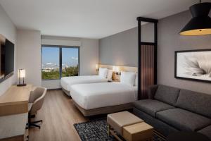 En eller flere senge i et værelse på Hyatt Place Cape Canaveral + 22 billeder