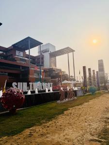 a view of a city with buildings in the background at StayWorks studios in Greater Noida
