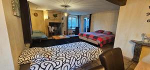 En eller flere senge i et værelse på Villa Gottem