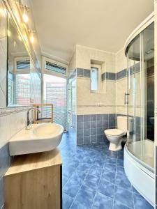 Phòng tắm tại Kukucinova Apartments