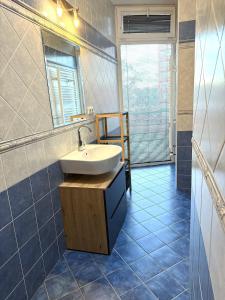 Phòng tắm tại Kukucinova Apartments