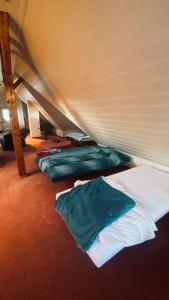 a room with three pillows on a bed in a tent at Ski Alm - Ferienunterkunft in Zella-Mehlis
