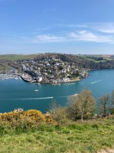 a view of a large body of water with a town at Capritia Guest House in Dartmouth
