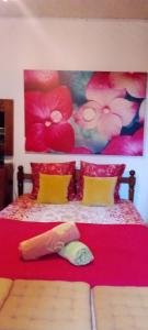 En eller flere senge i et værelse på Le coin tranquille