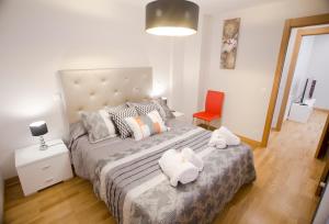 Postel nebo postele na pokoji v ubytování Apartamentos Amaiur