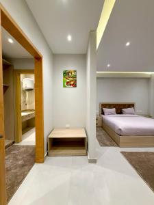 Giường trong phòng chung tại Elite hotel