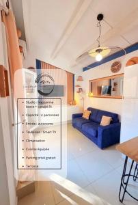 En eller flere senge i et værelse på Le Parfum bleuté