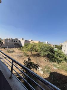 a view of a building from a balcony at Kripanidhi Homestay in Jodhpur