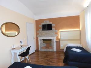 Et tv og/eller underholdning på PICCOLO HOTEL Nel Centro Storico di Firenze