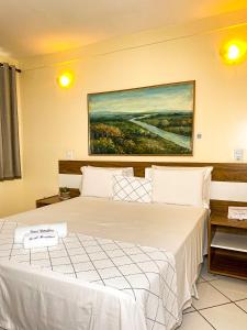 En eller flere senge i et værelse på Hotel Monólitos + 15 billeder