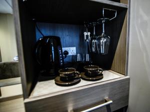 Kuchyň nebo kuchyňský kout v ubytování Ladywell House Suites - Chinatown - Self Check-in + 2 fotografie