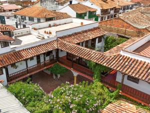 an overhead view of a city with roofs at Hotel Los Frayles in Villa de Leyva +47 photos