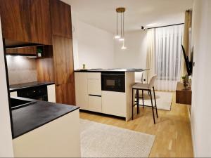 Køkken eller tekøkken på Infinity Apartment & Privat Garage