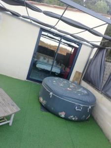 a large suitcase sitting on the floor of a tent at Cabalove in Quissac