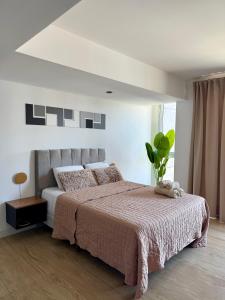 Postel nebo postele na pokoji v ubytování MarDelSuites - Studio Premium Piso 14 a Pasos del Mar, Amenities, Seguridad 24hrs, Cochera Opcional
