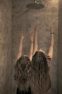 Khách lưu trú tại Aparthotel Familiaris - Family Apartments - Pools & Spa in Dolomites