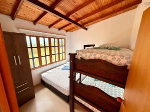 En eller flere senge i et værelse på Cabañas San Miguel Arcángel + 38 billeder