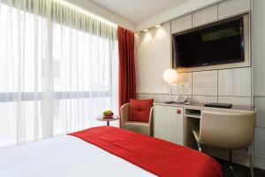 Postelja oz. postelje v sobi nastanitve Hotel St.Gotthard
